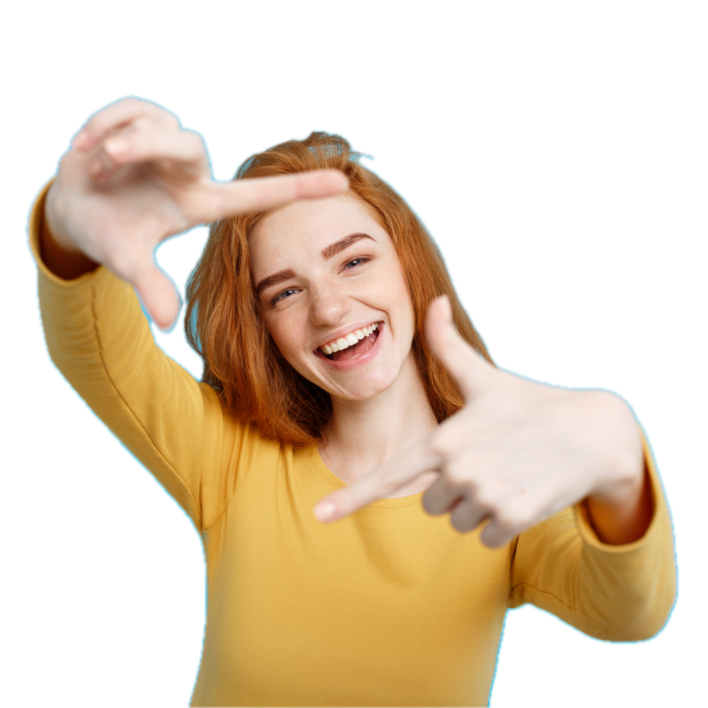 Happy Young Lady With Her Fingers In A Frame Over Her Smile